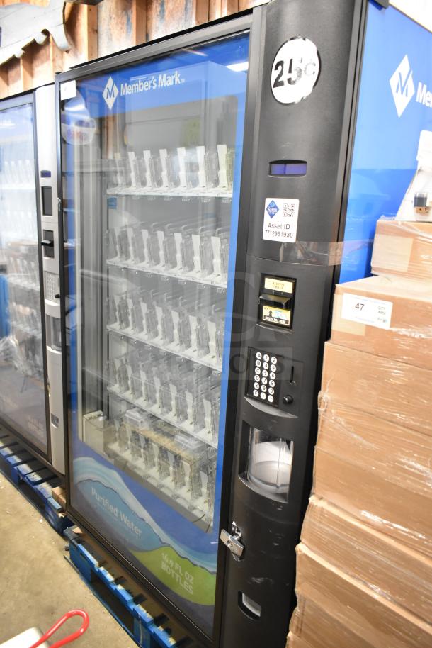 Crane 5800-4 commercial vending machine with bill acceptor, 115 volts, 1 phase. Includes display for bottled drinks.