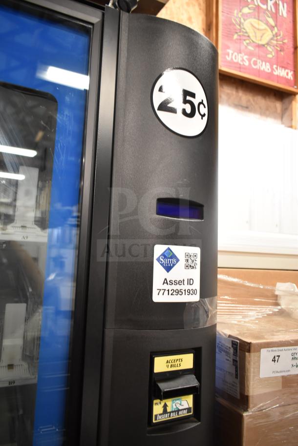Crane 5800-4 commercial vending machine with bill acceptor, label showing "25¢", asset ID 7712951930, 115 volts, 1 phase.