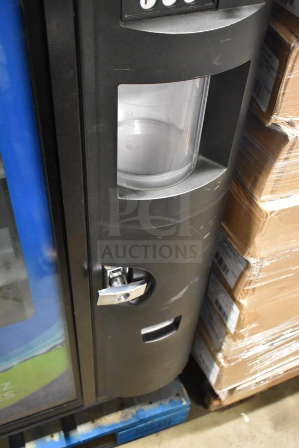 Crane 5800-4 bottled drink vending machine with bill acceptor, 115 volts, showing exterior with minor wear.