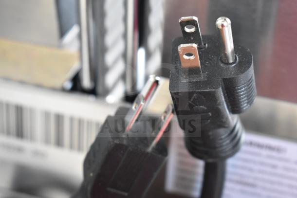 Brand new Avantco 177PG400 commercial panini grill power plug and barcode. 19 5/8" x 9 1/8" grooved plates. 120V.