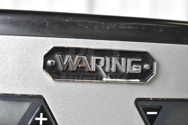 Waring WDM240TX Double Spindle Drink Mixer, visible logo, features three speeds and a timer, 120V, 1 Phase.