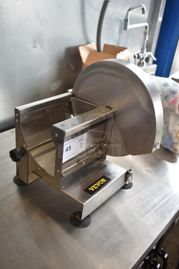 Vevor Countertop Vegetable Slicer, stainless steel, excellent condition. Features adjustable slicing mechanism. Label indicates lot 45 at PCI Auctions.