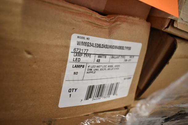 Box with label for W/MEG34LED6LDASUNVDIM4080SLTYPE50 4' LED light, 48 watts, 6000L, 4000K, dimmable, new scratch and dent.