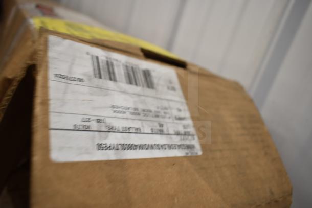 Cardboard box with label showing barcode and shipping information, containing 60 brand new scratch and dent 4' LED lights.