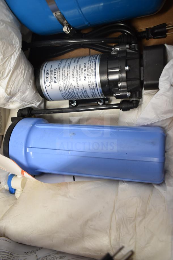 Corrigan Water Filtration System, model PSF1SU, shown with blue housing, label indicates "Made in USA," in new condition.