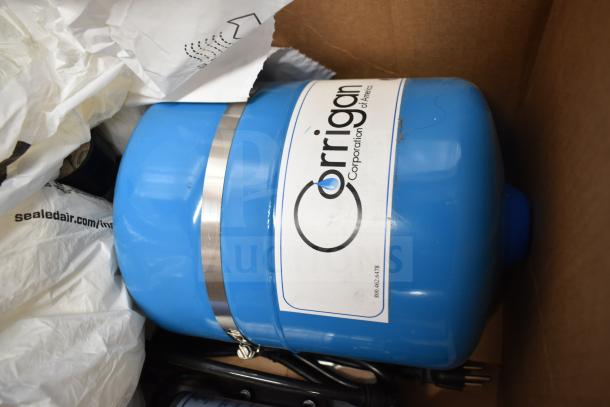 Corrigan Water Filtration System, blue, metal band, "Corrigan Corporation of America" label, in box.