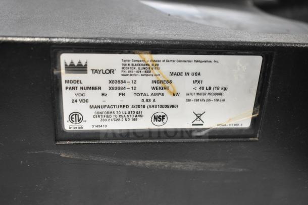Label on equipment showing Taylor model X83684-12, made in USA, 24 VDC, manufactured 4/2016, includes ETL and NSF certifications.