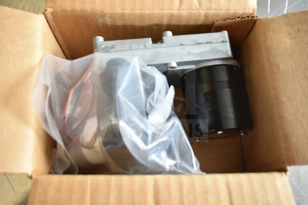 Box with CD-45D Brushless Motor and Ametek WindJammer, both in protective packaging. Auction for two items.