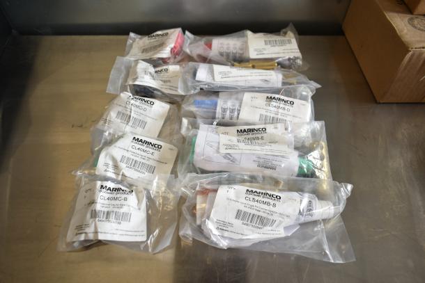 10 Marinco items including models CL40MC-C, CL40MC-A, CLS40MB-C, CLS40MB-A, CL40MC-D, CLS40MB-D, CL40MC-E, CLS40MB-E, CL40MC-B, CLS40MB-B, in original packaging.