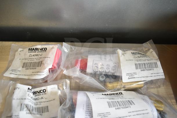 10 Marinco power products in sealed bags, including models CL40MC-C, CLS40MB-C, and others. New condition, barcode visible.