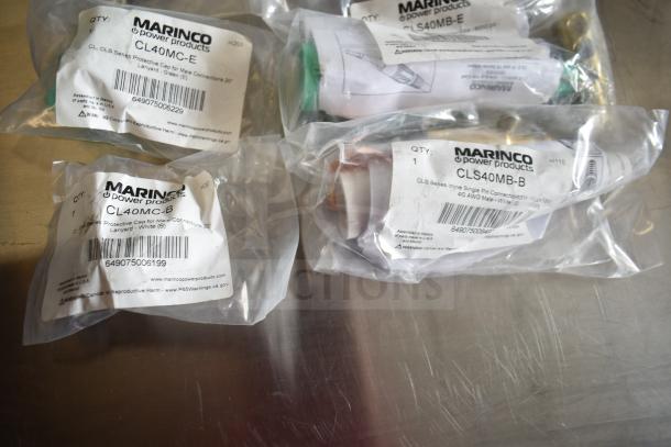 Assorted Marinco items CL40MC/CLS40MB series in packaging, labeled for male connections and protection.