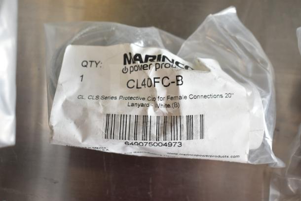 Marinco protective cap, model CL40FC-B, in sealed packaging, labeled for female connections, 20" lanyard, white.
