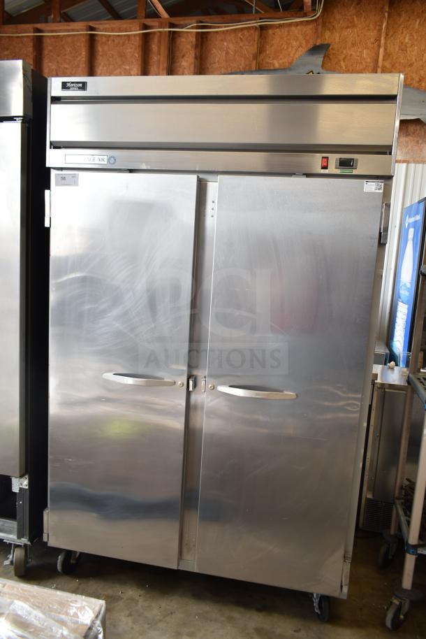 Beverage Air HR2-1S commercial 2-door reach-in cooler, stainless steel, 115 volts, 1 phase, on casters, in good condition.