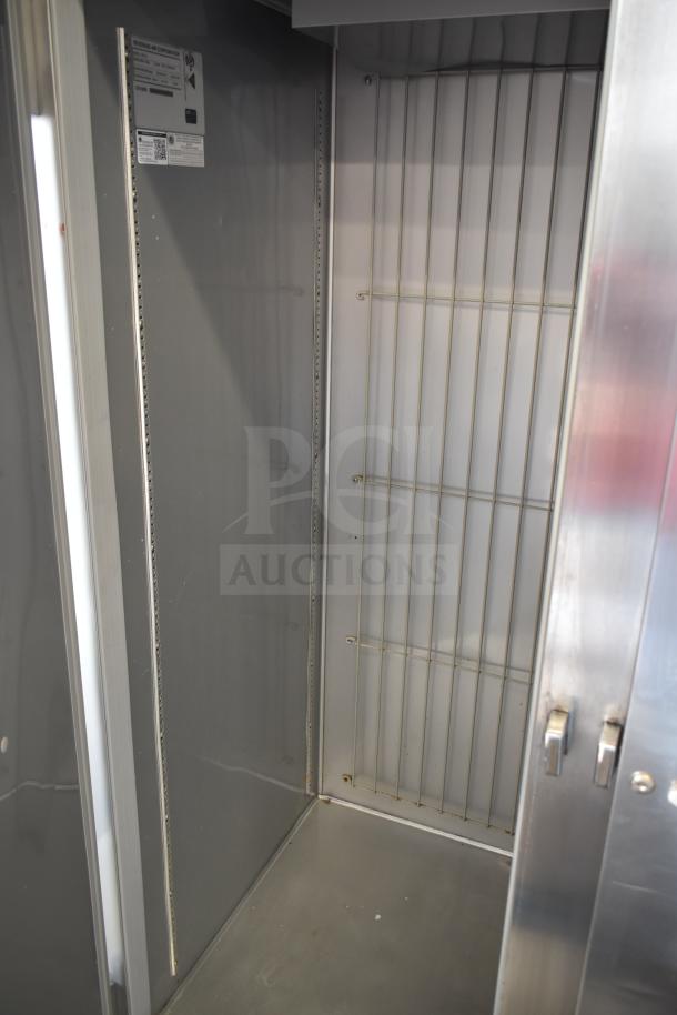 Beverage Air HR2-1S commercial reach-in cooler, two-door, 115V, with interior shelving supports, clean condition.