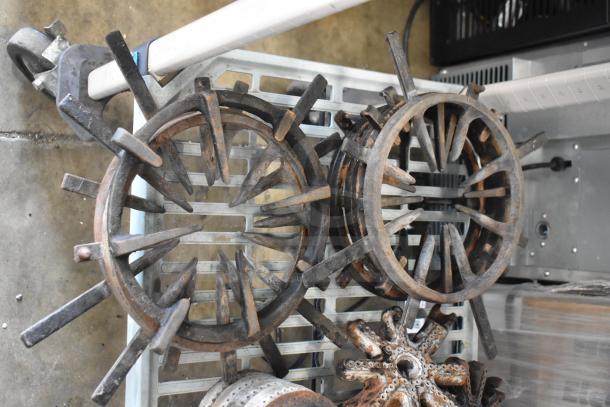 Set of metal grates and components, slightly rusted, suitable for range; includes gas hose. Bundle of 32 items.