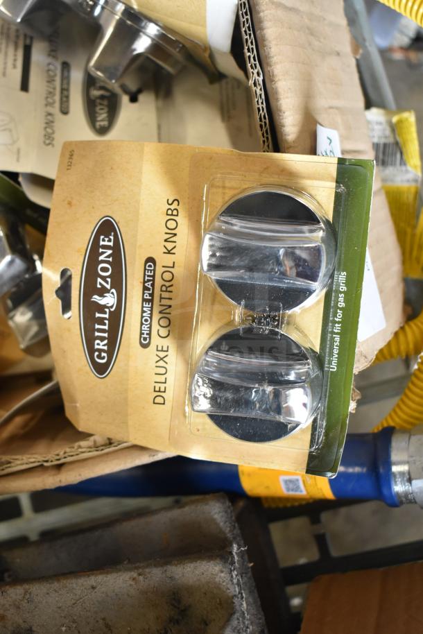 Chrome-plated Grill Zone deluxe control knobs for gas grills, packaged, with visible branding and labeling.