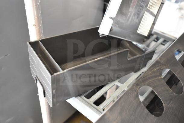 16 assorted items including portafilters, Turbo Air CONLOOP2848 condensate loop, and poly pieces for ice cream machines.