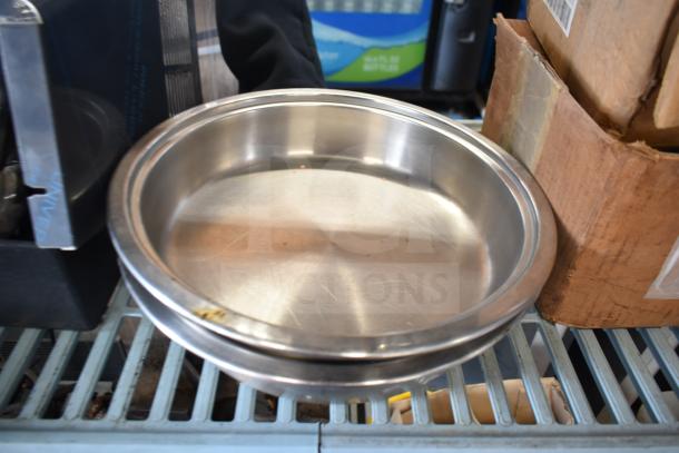 Stainless steel bowl on shelf, part of 16-item auction including portafilters and Turbo Air CONLOOP2848. Good condition.