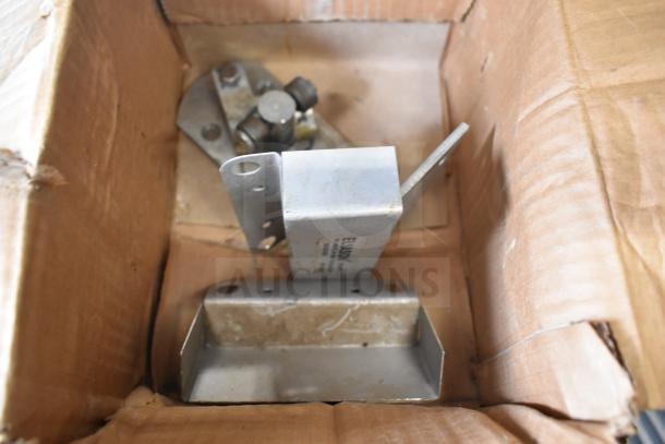 Box containing various metal components, including Turbo Air CONLOOP2848 condensate loop, in used condition.