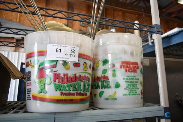 Two buckets labeled "Philadelphia Water Ice," with metal parts inside. Label: Lot 61, Qty 92x. 2.5-gallon capacity.