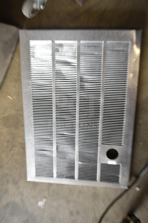 Cornelius Ice Head Panel, metal with vertical grill pattern, used condition, opening at bottom right corner.