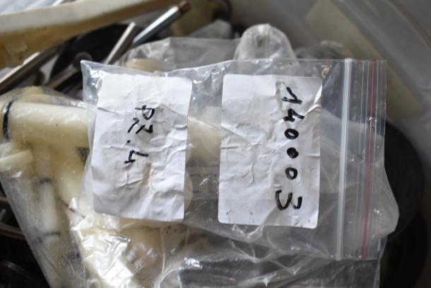54 ice cream machine parts for Taylor models, bagged and labeled. Includes miscellaneous components. Condition: used.