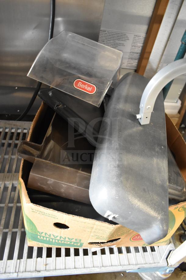 Box of 40 assorted ice cream and frozen beverage machine parts, including Berkel marked component. Various conditions.