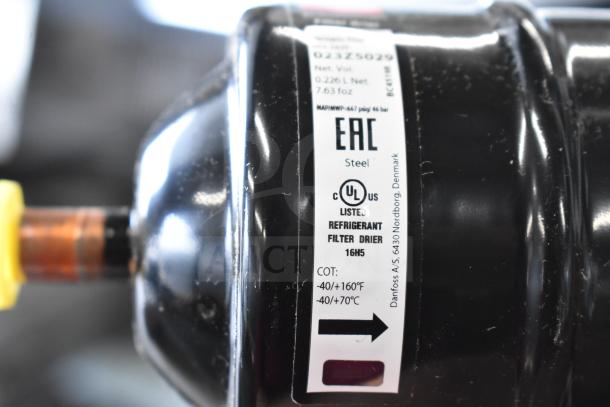 2 Danfoss Eliminator Filter Drier, UL listed, steel, 0.226L, 16H5 model, -40/160°F range, shown with product label.