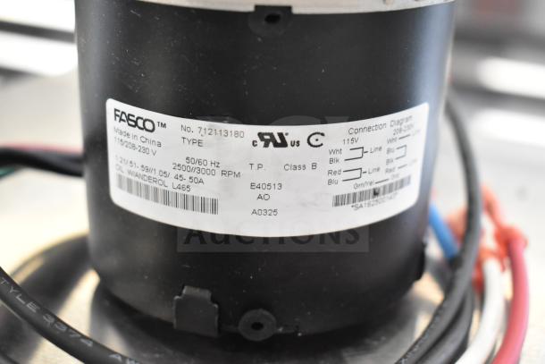 BRAND NEW Fasco 712113180 motor for warming cabinet, 3.3" diameter, 115/208-230V, single phase, visible label details.