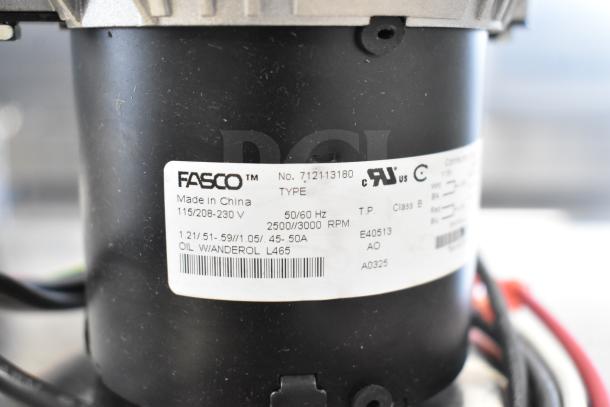 Brand new Fasco 712113180 3.3" motor for warming cabinet, 115/208-230V, labeled with specs, made in China.