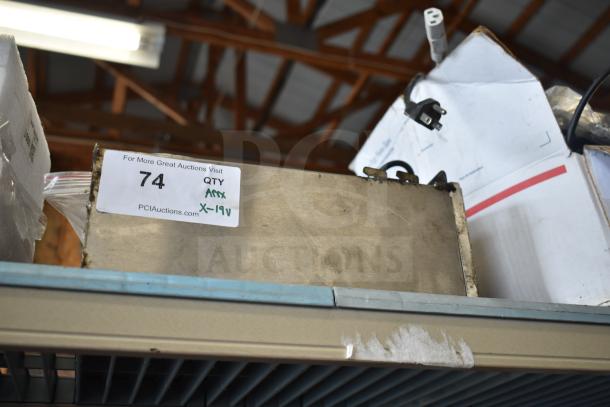 Box of 19 assorted items including wires and a drip tray, visible auction tag marked with "74, QTY, X-19".