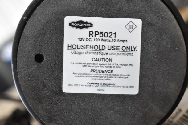 Label on a RoadPro RP5021 air pot base, indicating 12V DC, 120 Watts, 10 Amps. For household use only.