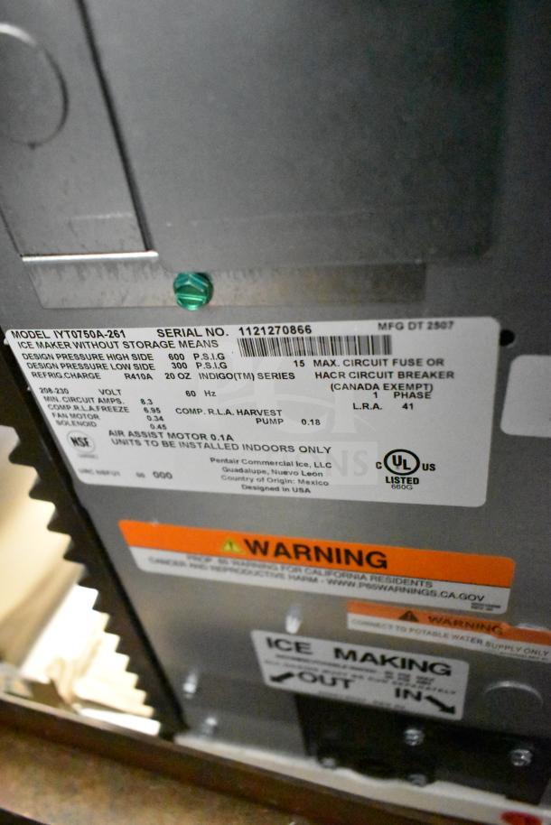 2025 Manitowoc IYT0750A-261 Indigo NXT ice machine label showing model, serial number, voltage, and warnings.