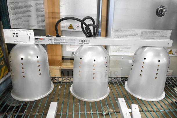 Brand new ServIt 423BLS3 Suspension Bar with 3 Bulb Heat Lamp, 120 Volts, 1 Phase. Minor scratches and dents visible.