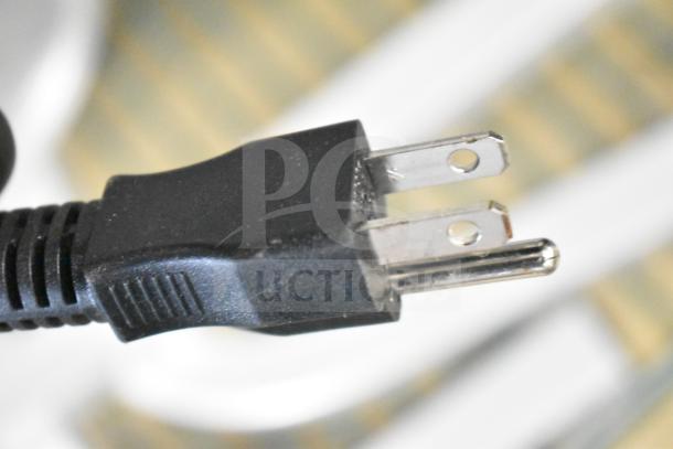 Close-up of a power plug for the ServIt 423BLS3 Heat Lamp, showing standard 120V, 1-phase plug, in new condition.