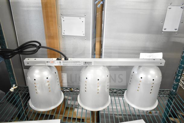 Brand new ServIt 423BLS3 3-bulb heat lamp with suspension bar, 120V, 1 phase. Visible label indicates scratch and dent condition.