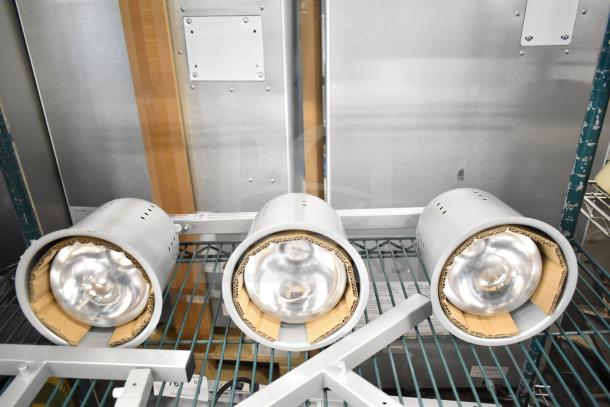 Brand new ServIt 423BLS3 suspension bar 3-bulb heat lamp, 120 volts, 1 phase, showing minor scratches and dents.