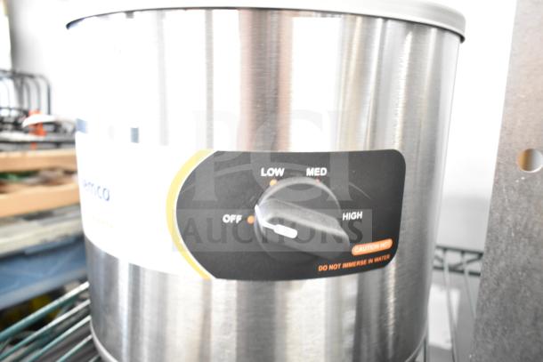 Brand new 2025 Nemco 6100A 7 Qt. countertop warmer, 120 volts, 1 phase. Features control dial and caution label.