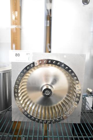 Brand new 2025 Nidec motor, 115-120 volts, 1 phase, scratch and dent condition. Image shows front view on shelf.