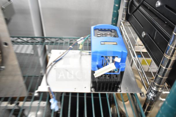 BRAND NEW SCRATCH AND DENT! Genesis KBDF-24D AC Drive, 115/208-230V, 1 Phase, visible connections and label, minor exterior marks.