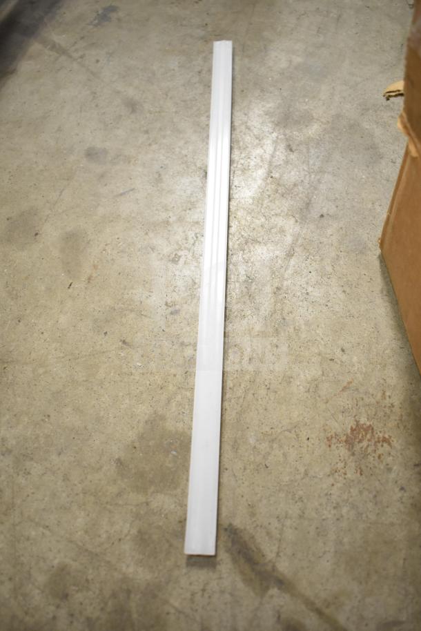 Long white metal strip; part of a lot including range grates and Turbochef kick plates. Condition appears to be good.