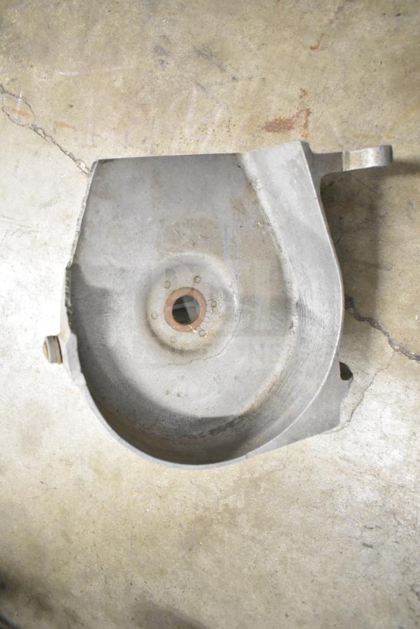 Metal component from beverage machine hopper, used condition, visible wear and patina. Suitable for replacement or parts.