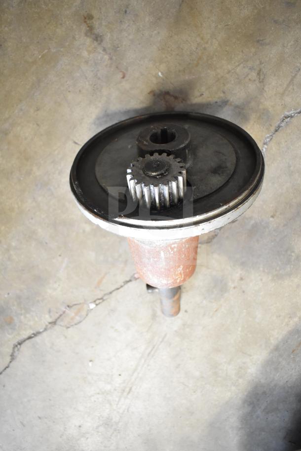 Industrial metal component with gears, moderate wear, part of a lot including beverage machine hoppers and more.
