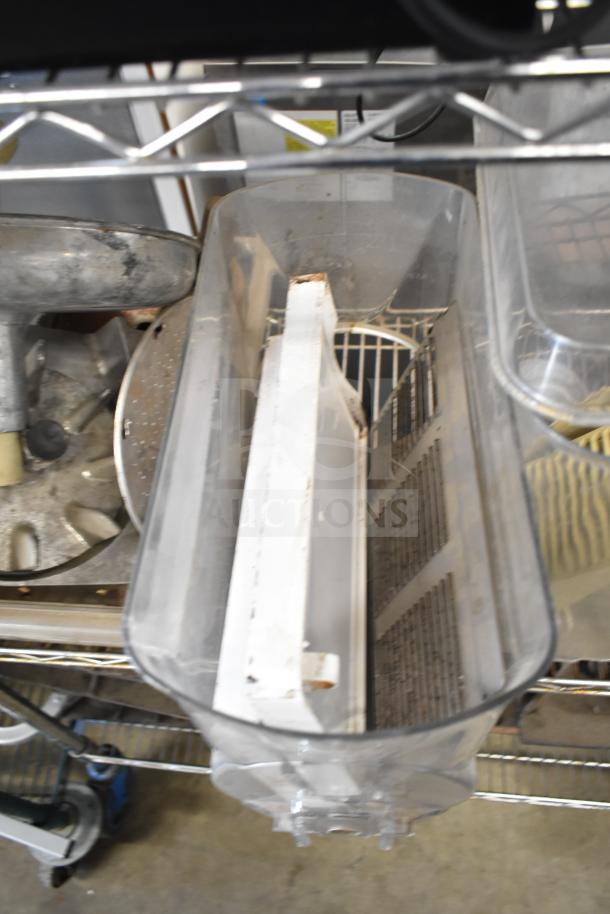 20 various kitchen machine parts, including beverage machine hoppers, meat grinder tray, and vegetable chute pusher. Used condition.