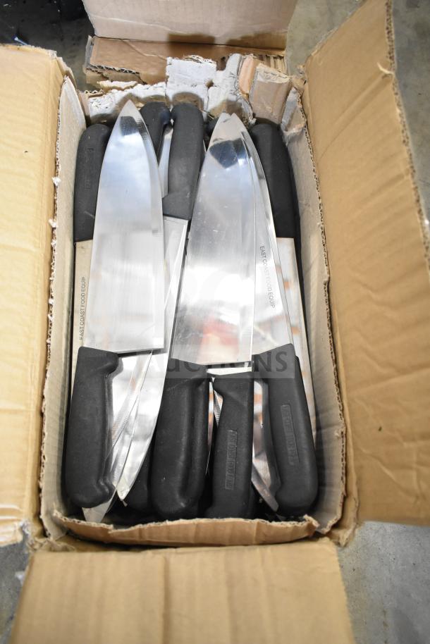 Box containing 70 sharpened stainless steel chef knives with black handles, marked "East Coast Food Equip," in new condition.