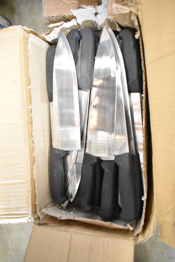 70 sharpened stainless steel chef knives with black handles in cardboard box.