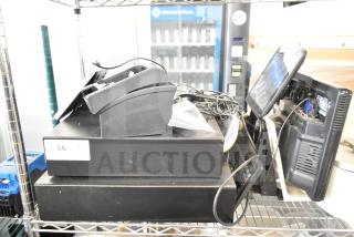 POS system with two cash drawers, receipt printer, and Toast monitor on metal shelving. Visible wiring. Item labeled "86".