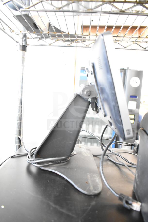 POS system with Toast monitor and cables, shown from the side on a black base. Visible wear, includes 2 cash drawers and receipt printer.