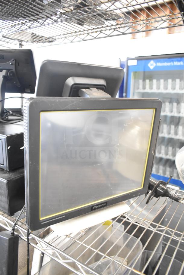 POS system with Berseron monitor, includes 2 cash drawers, receipt printer. Visible wear, ideal for retail use.