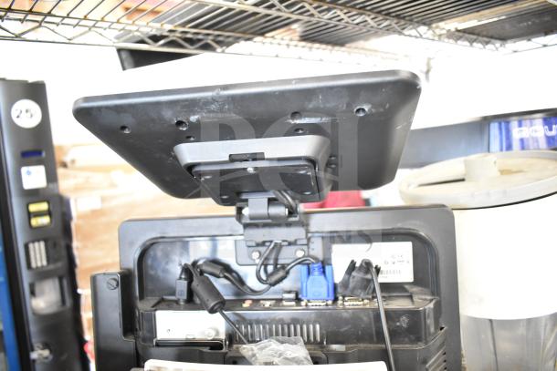 POS system with Toast monitor, visible cables, and connectors. Includes 2 cash drawers and receipt printer, in good condition.